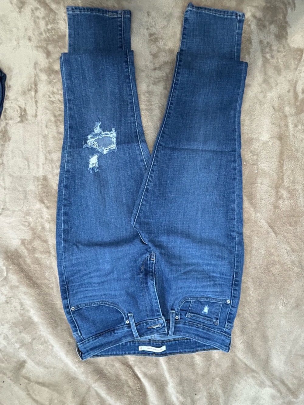 Levi's High-Rise Distressed Jeans in Dark Blue